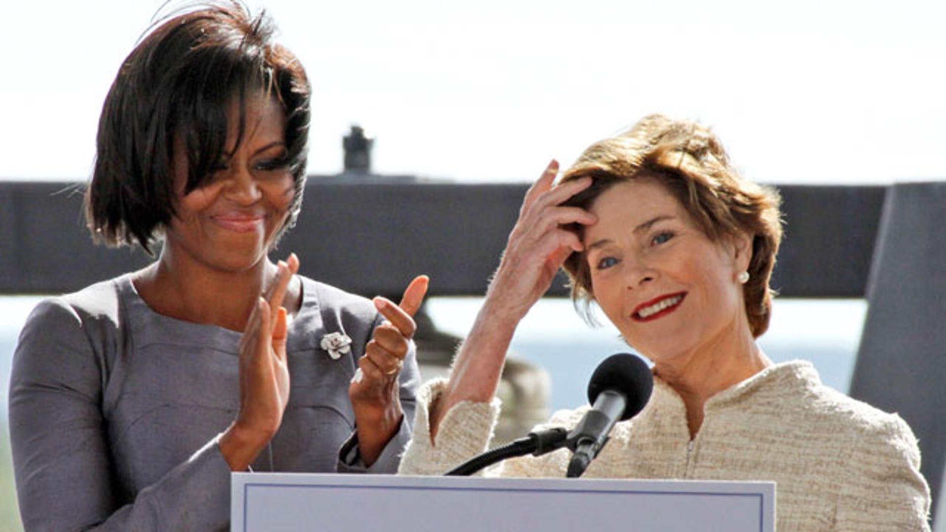 First lady Michelle Obama with former first lady Laura Bush at 9/11 Memorial