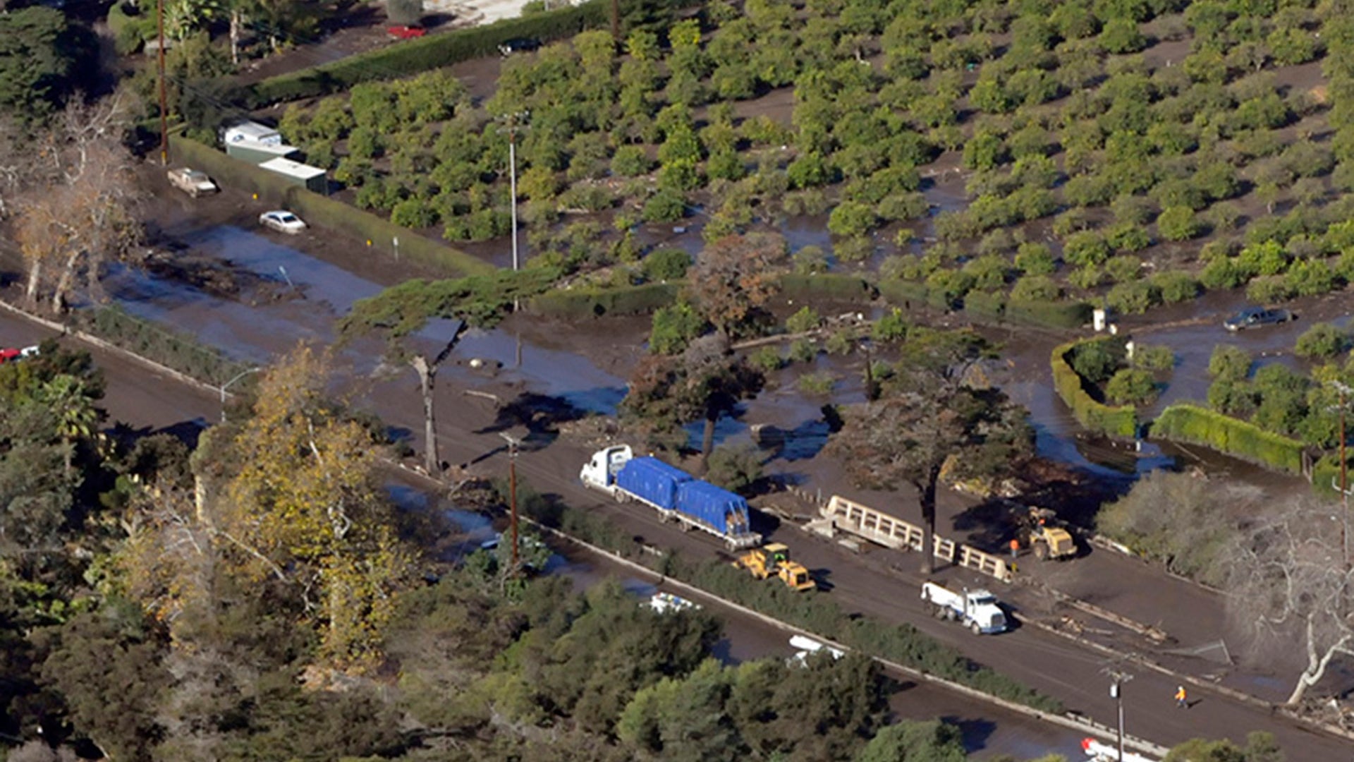 Mud and leftover debris was sent down hillsides that were burned by the Thomas Fire