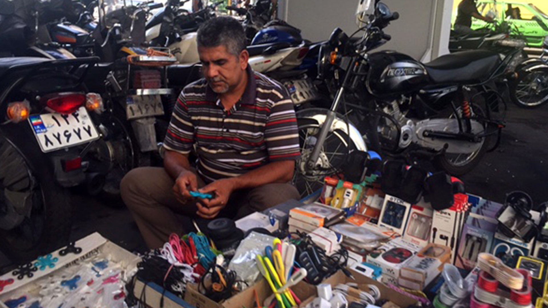 Man selling goods on the streets of Tehran