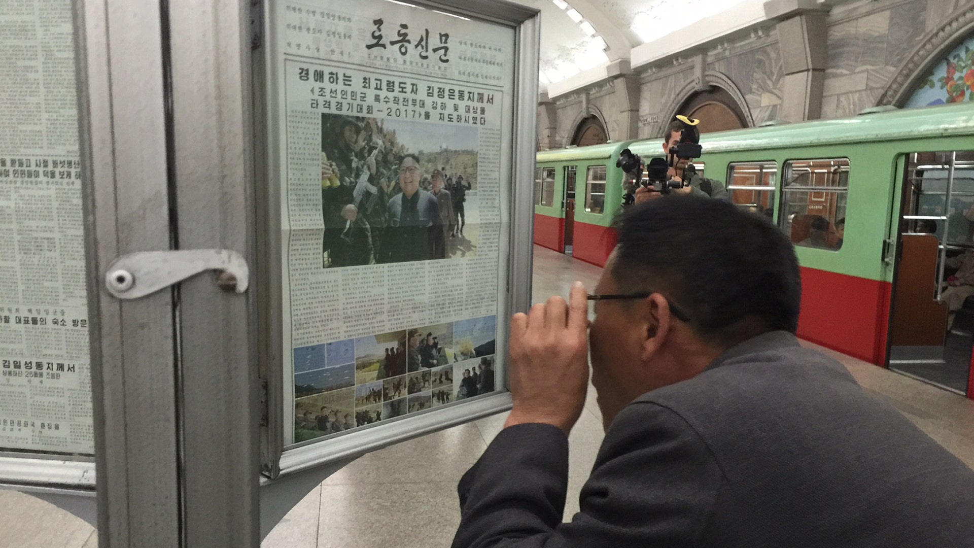Newspaper at the Metro Station 