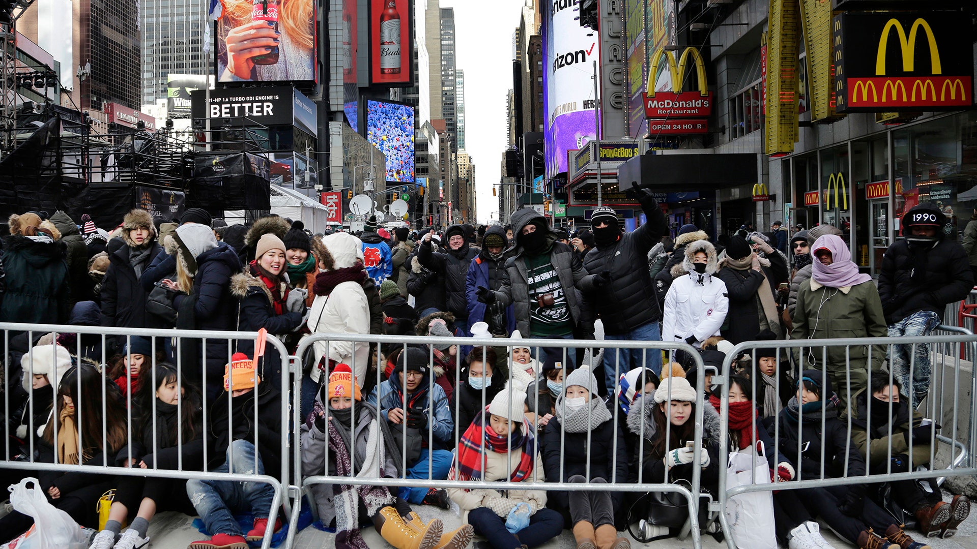 Spectators gather ahead of the New Year's Eve celebration in Times Square in New York