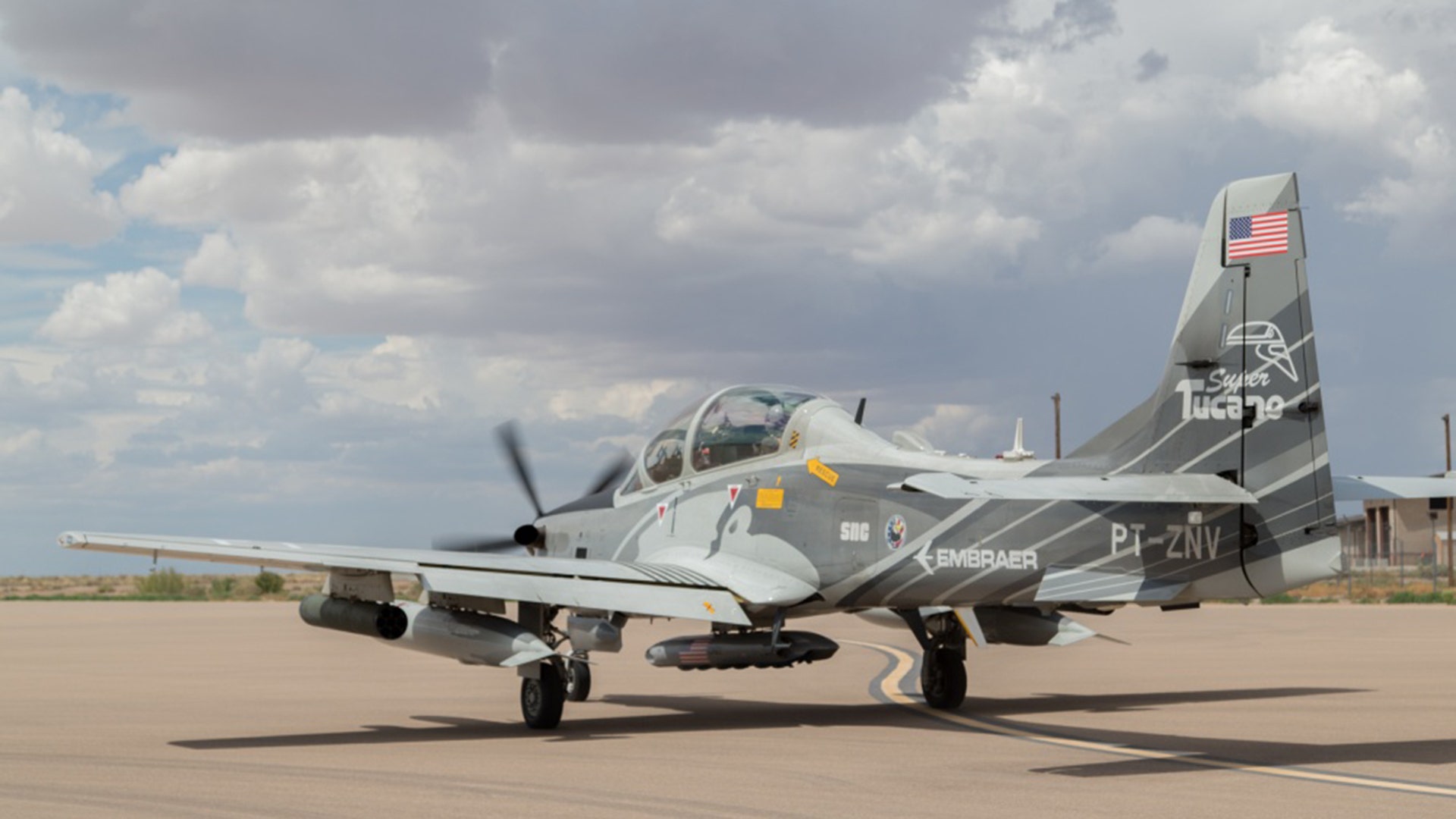 An Embraer A-29 experimental aircraft taxies during OA-X trials at Holloman AFB. 