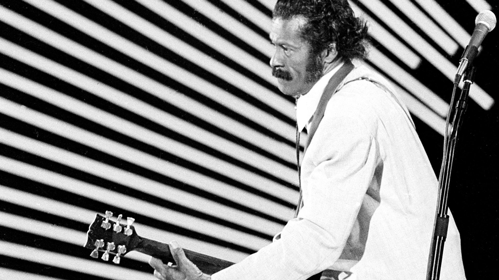 Guitarist and singer Chuck Berry performs his 