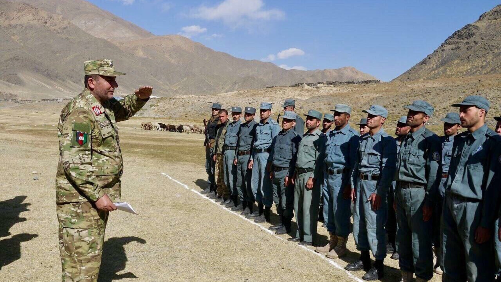Panjshir Province Police Chief Mohammad Ishaq Tamken with his team