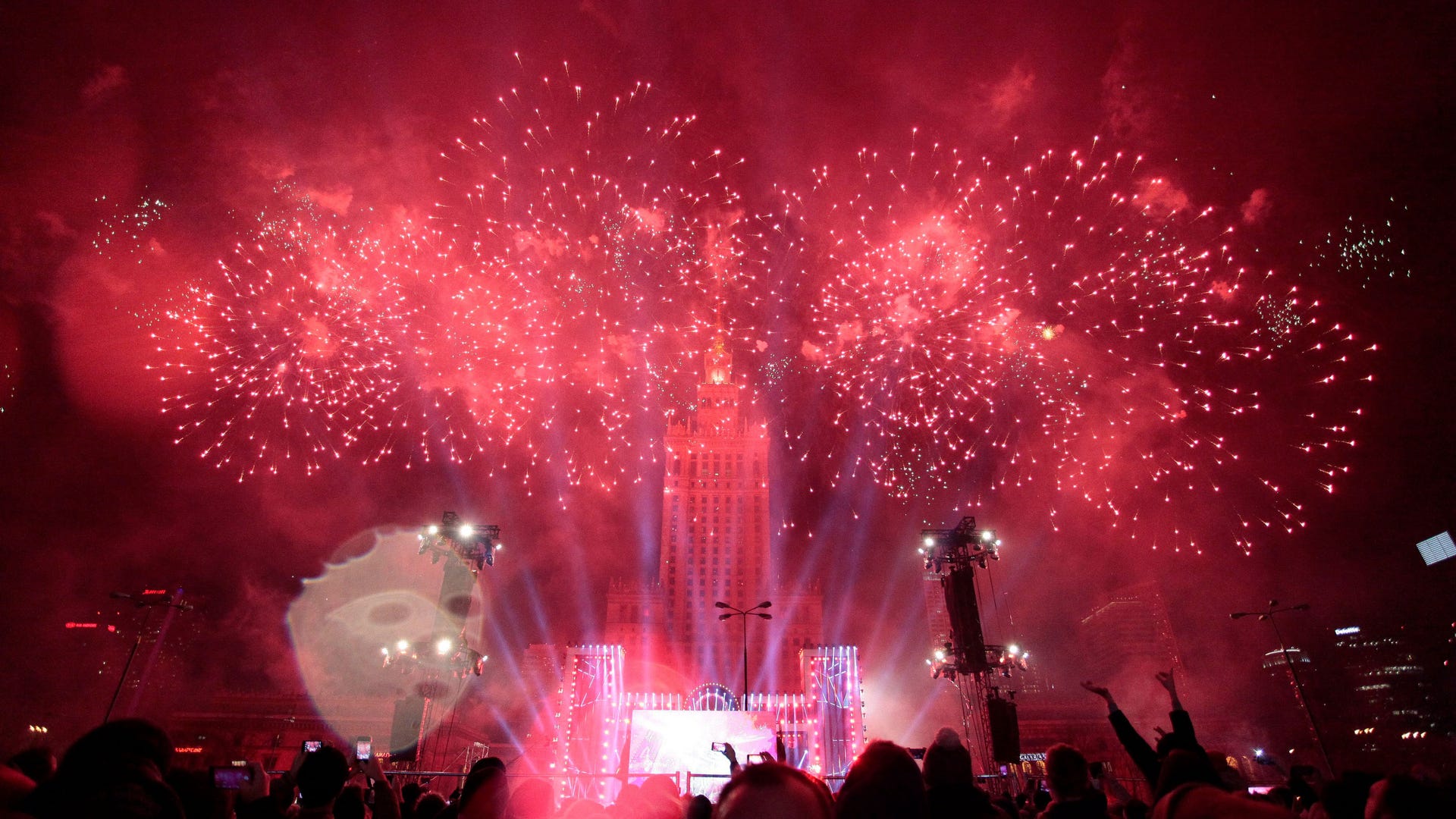 Fireworks explode next to the Palace of Culture during New Year celebrations in Warsaw, Poland January 1, 2017. 