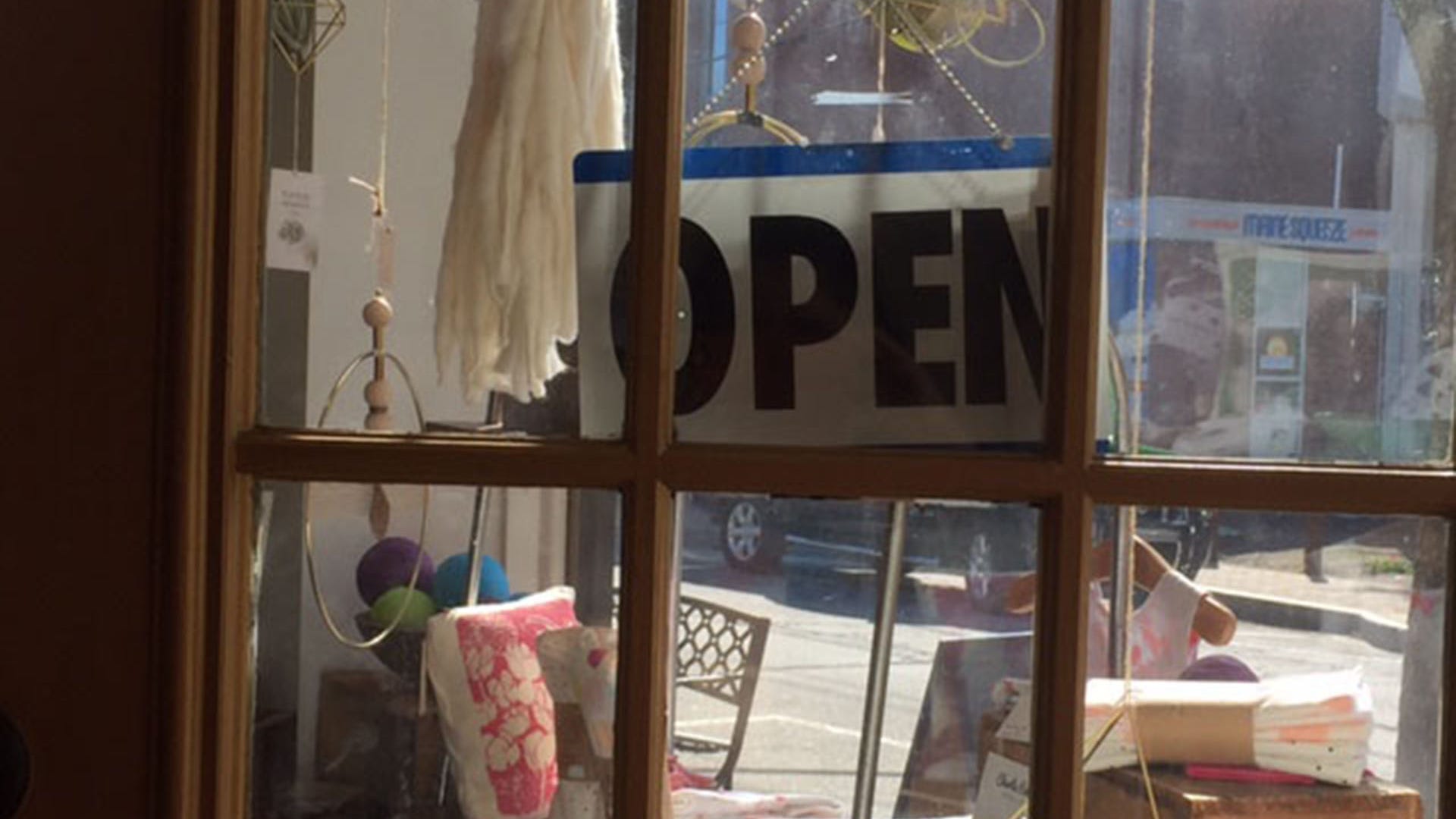 A sign at the Tayla Mac boutique, which is located around the corner from the Portsmouth Naval Shipyard in Kittery, Maine