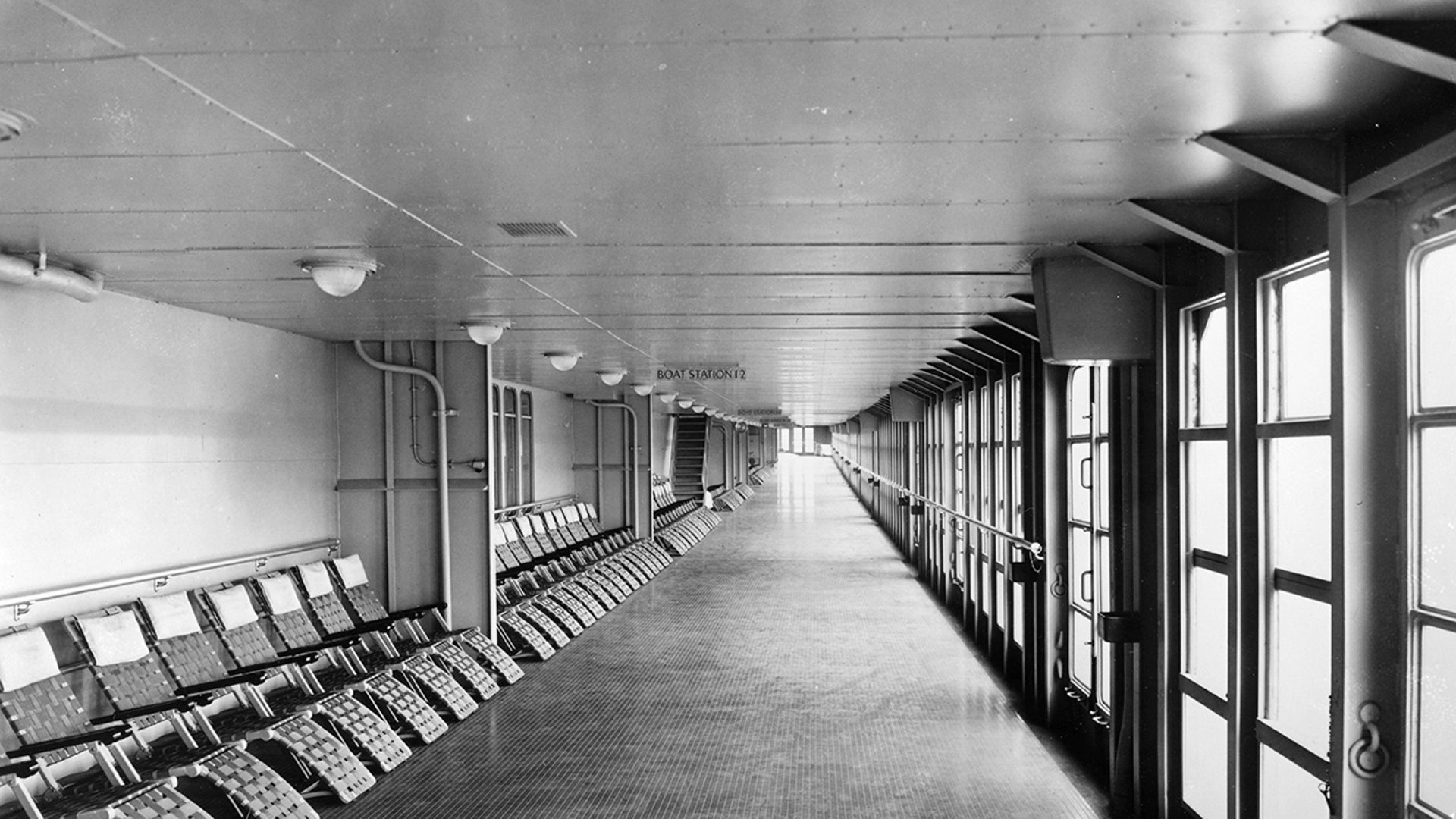 The promenade is photographed as it appeared in the ship's day.