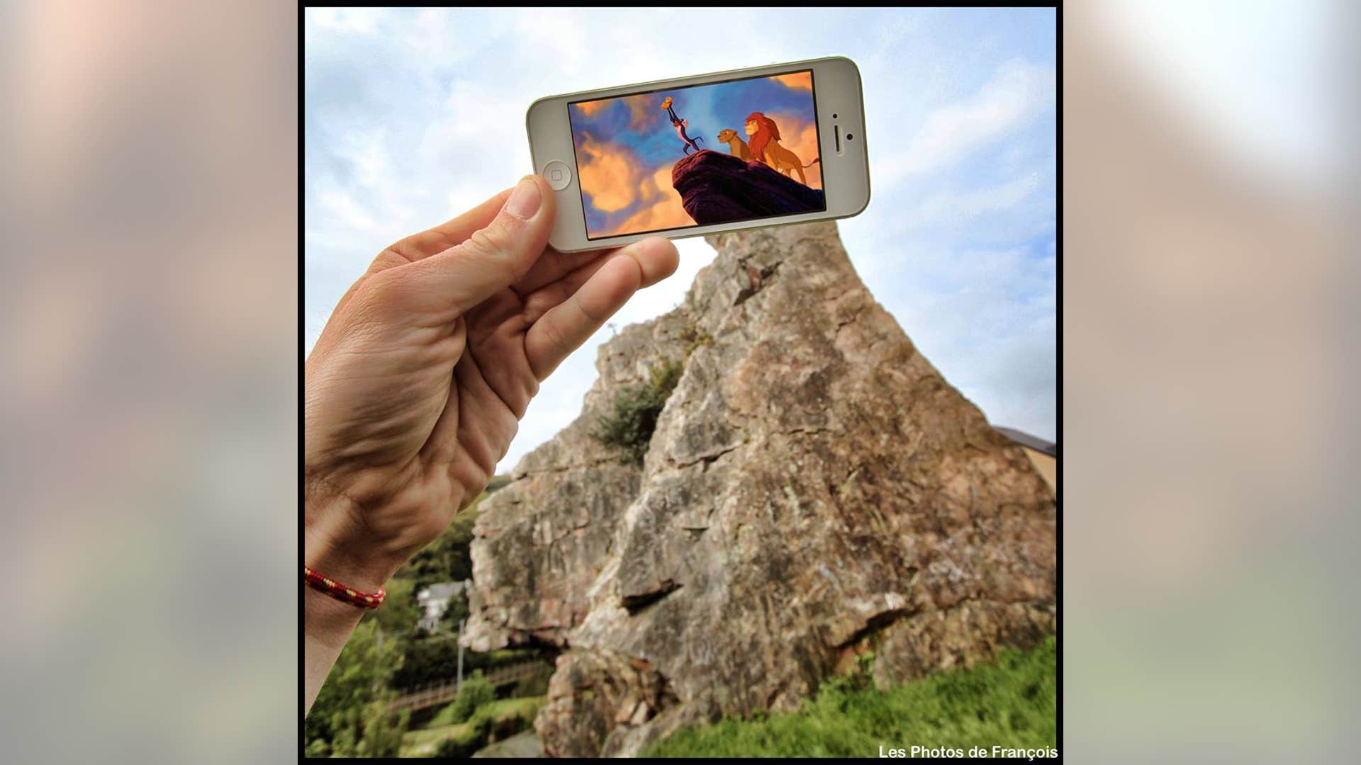 Simba gets a lift on Pride Rock.