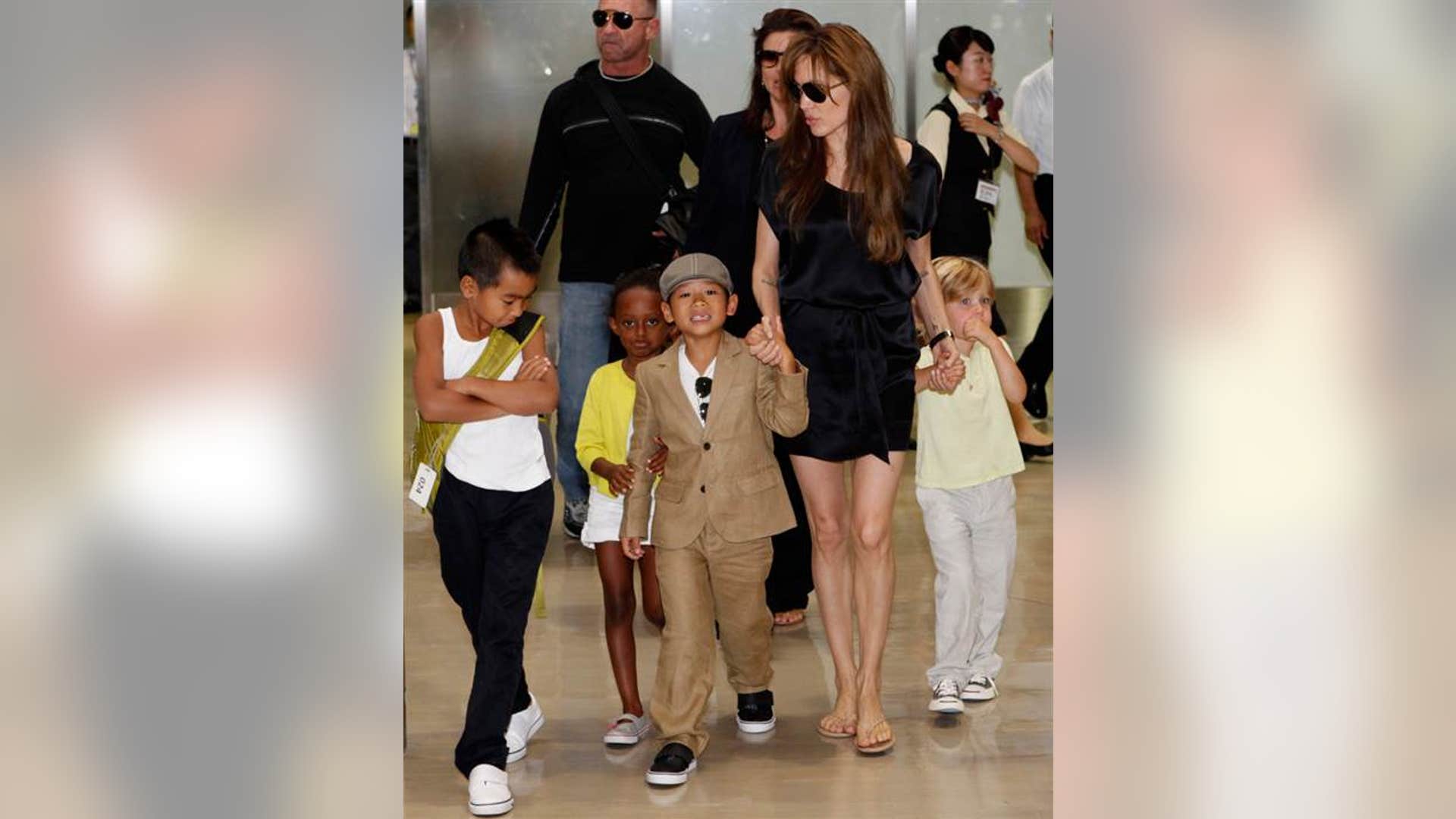 The Jolie-Pitts snack on bugs.