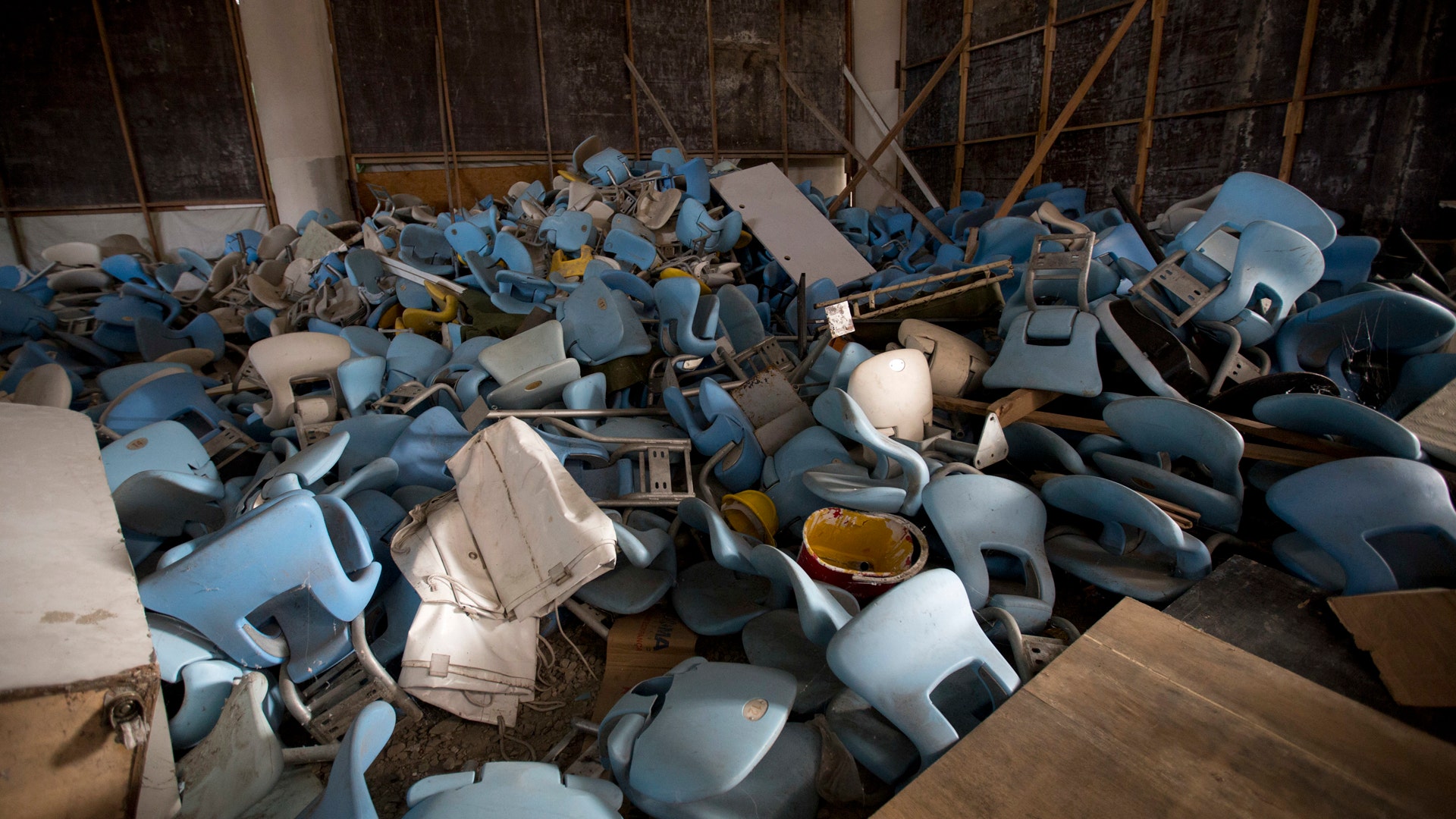 Photo shows seats jumbled in a pile inside Maracana stadium.