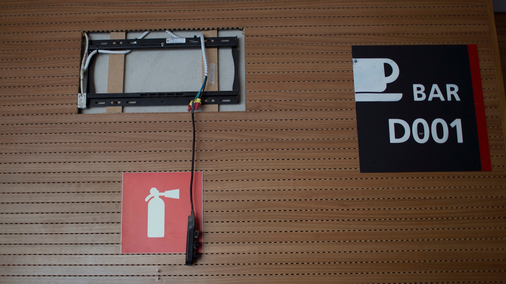 Cables from a stolen TV hang inside Maracana stadium.