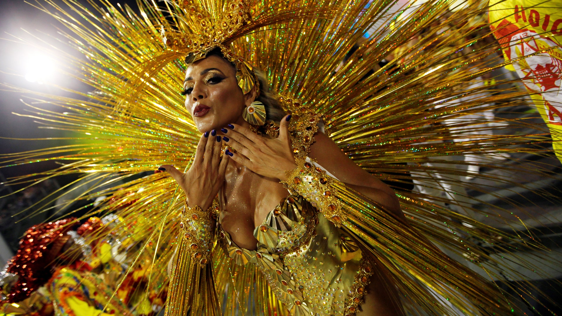 A dancer parades for the Tom Maior samba school during Carnival in Sao Paulo.