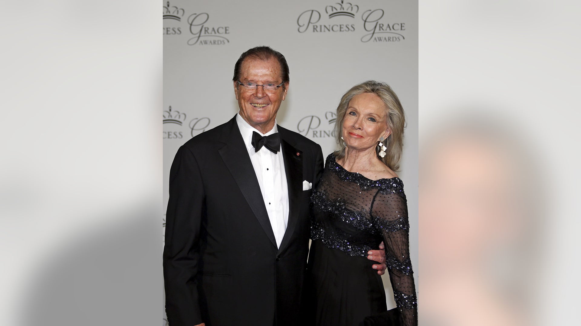 Moore and his wife Kristina Tholstrup arrive at the 2015 Princess Grace Awards gala in Monaco, September 5, 2015