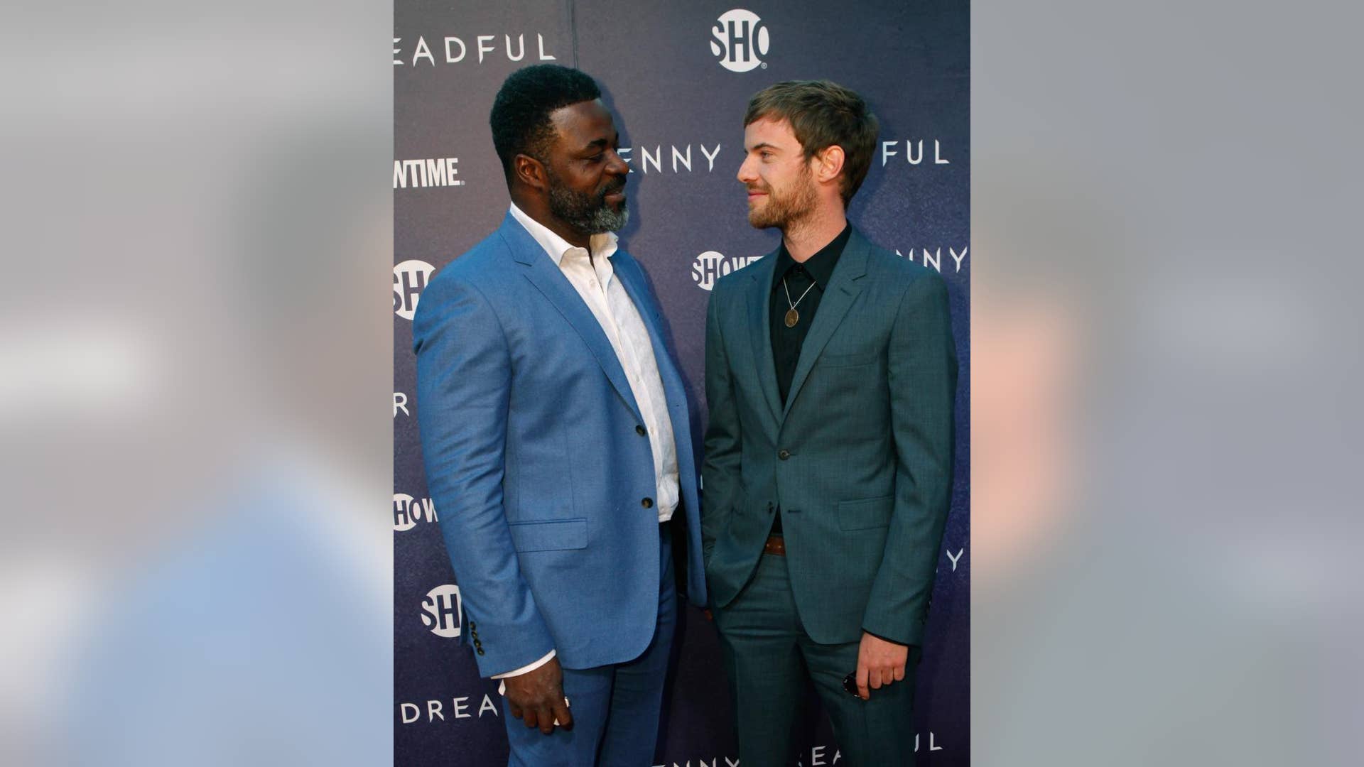 Cast Members Danny Sapani (Left) And Harry Treadaway