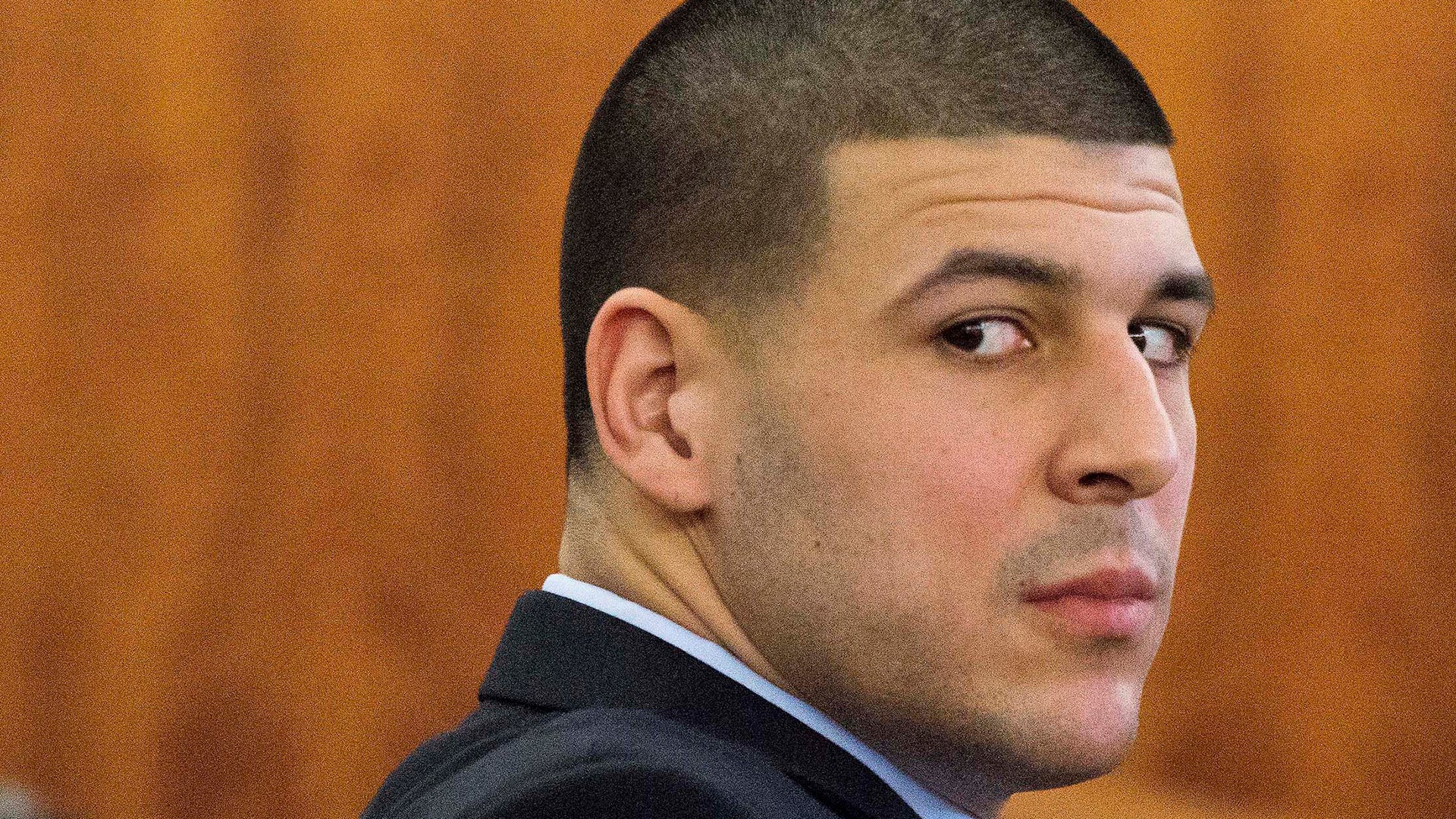  Former NFL player Aaron Hernandez looks at the gallery during the murder trial at the Bristol County Superior Court in Fall River