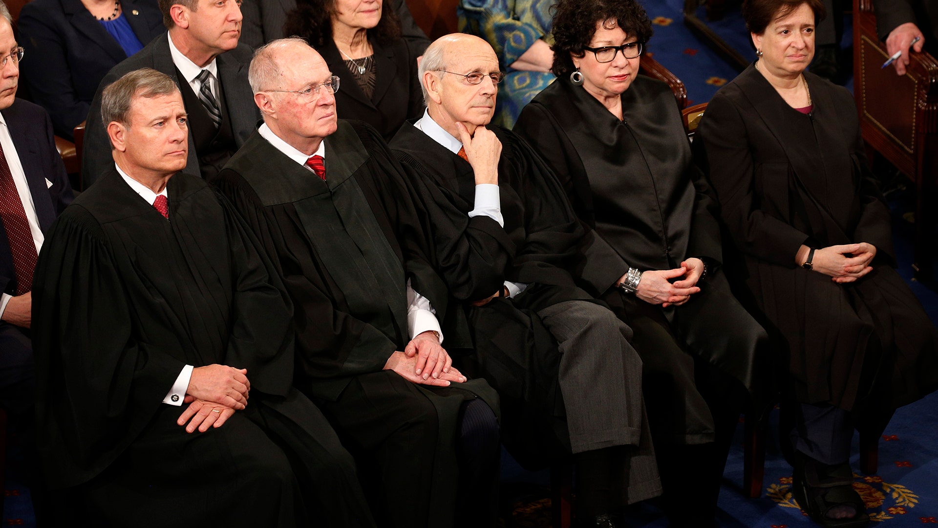 U.S. Supreme Court Justices listen as President Trump addresses Congress.