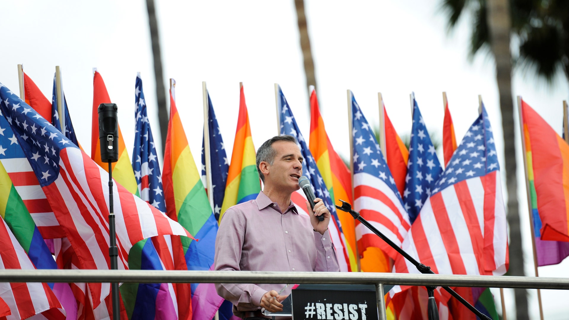 L.A. Mayor Eric Garcetti addresses the crowd before a Resist March that replaced the annual Pride Parade in Los Angeles, California