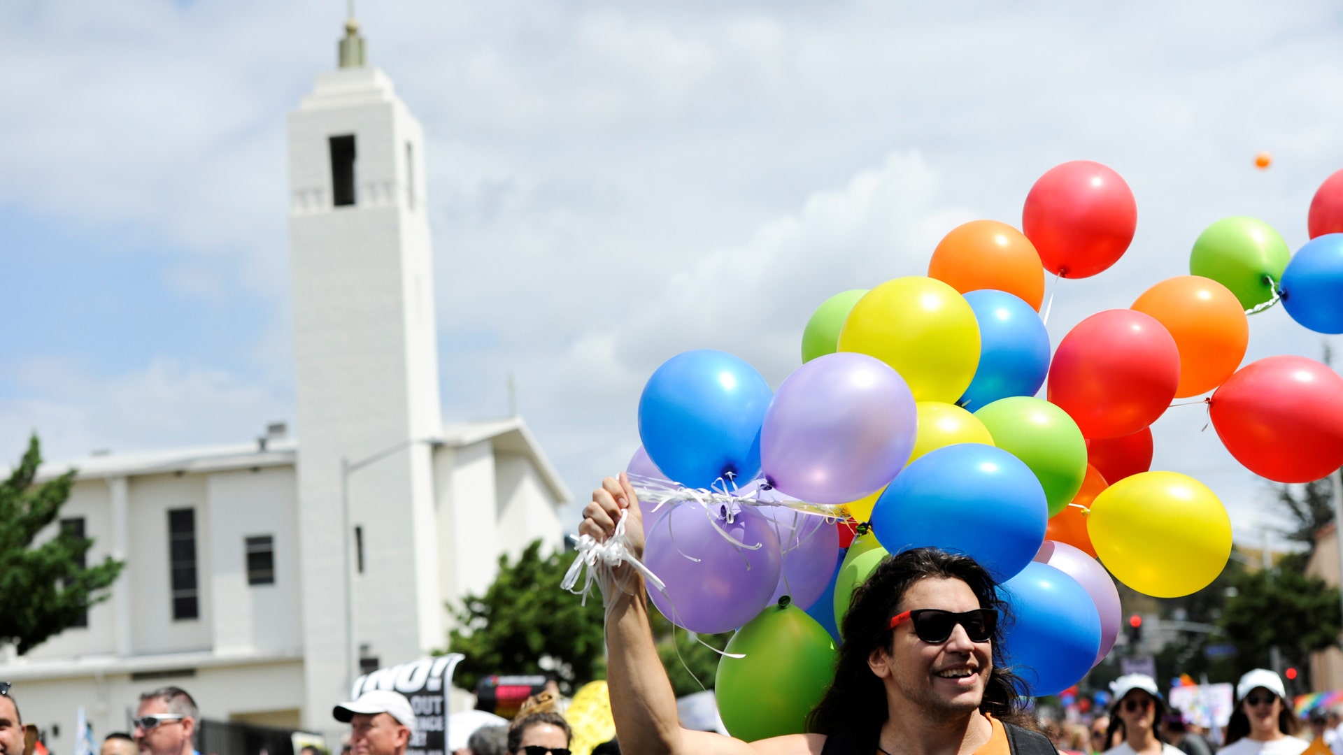 People participate in a Resist March that replaced the annual Pride Parade in Los Angeles, California