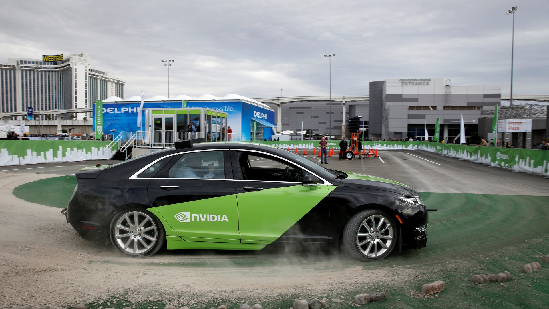 An autonomous-driving Lincoln MKZ equipped with Nvidia technology gives demonstration rides during the 2017 CES in Las Vegas, Nevada.