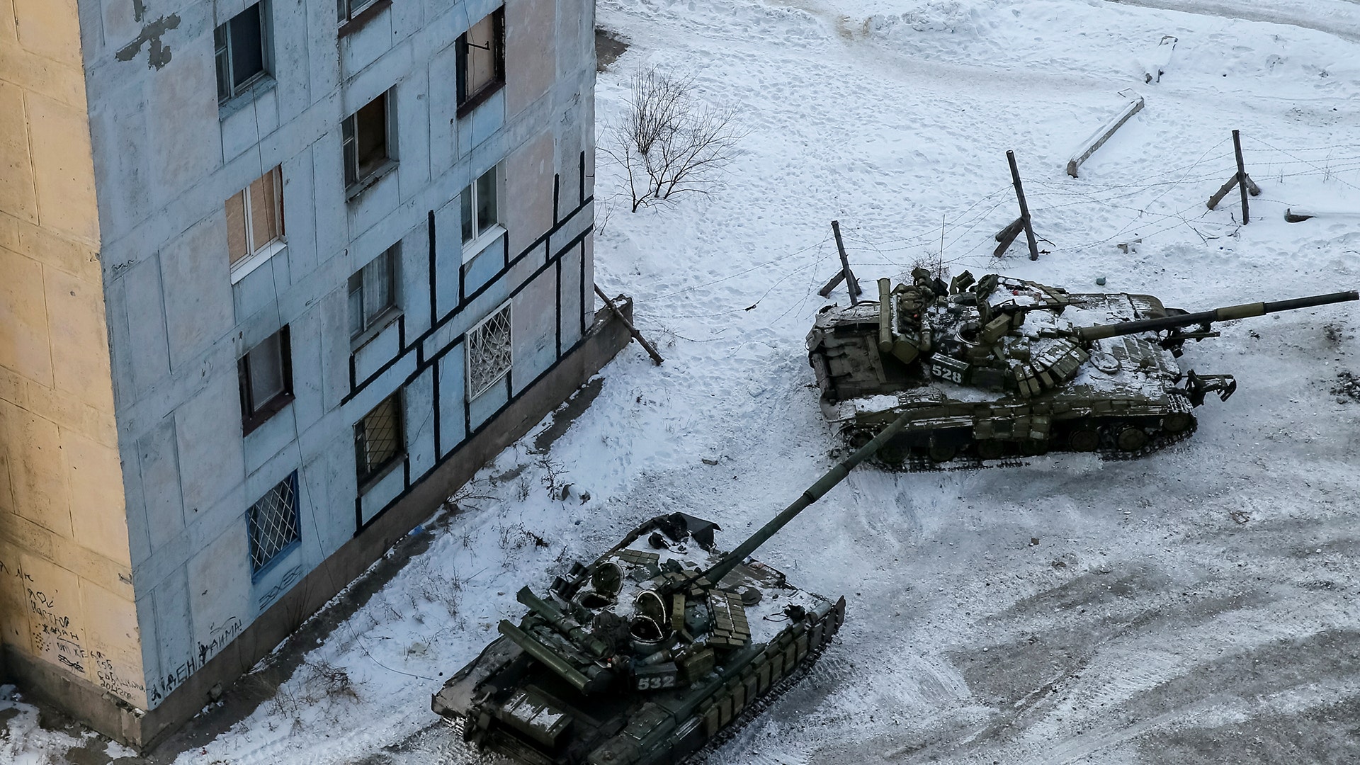 Tanks are seen in the government-held industrial town of Avdiyivka.