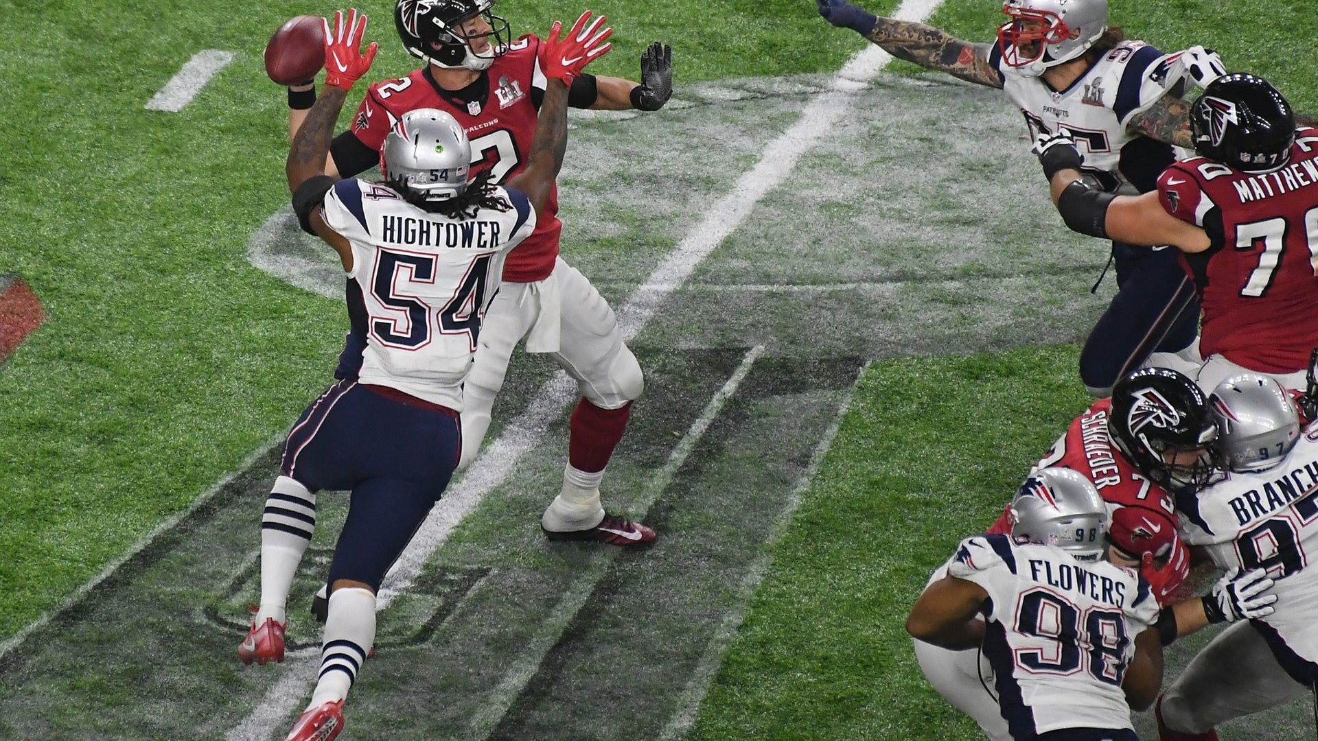 Atlanta Falcons quarterback Matt Ryan (2) fumbles as he is hit by New England Patriots middle linebacker Dont'a Hightower (54)