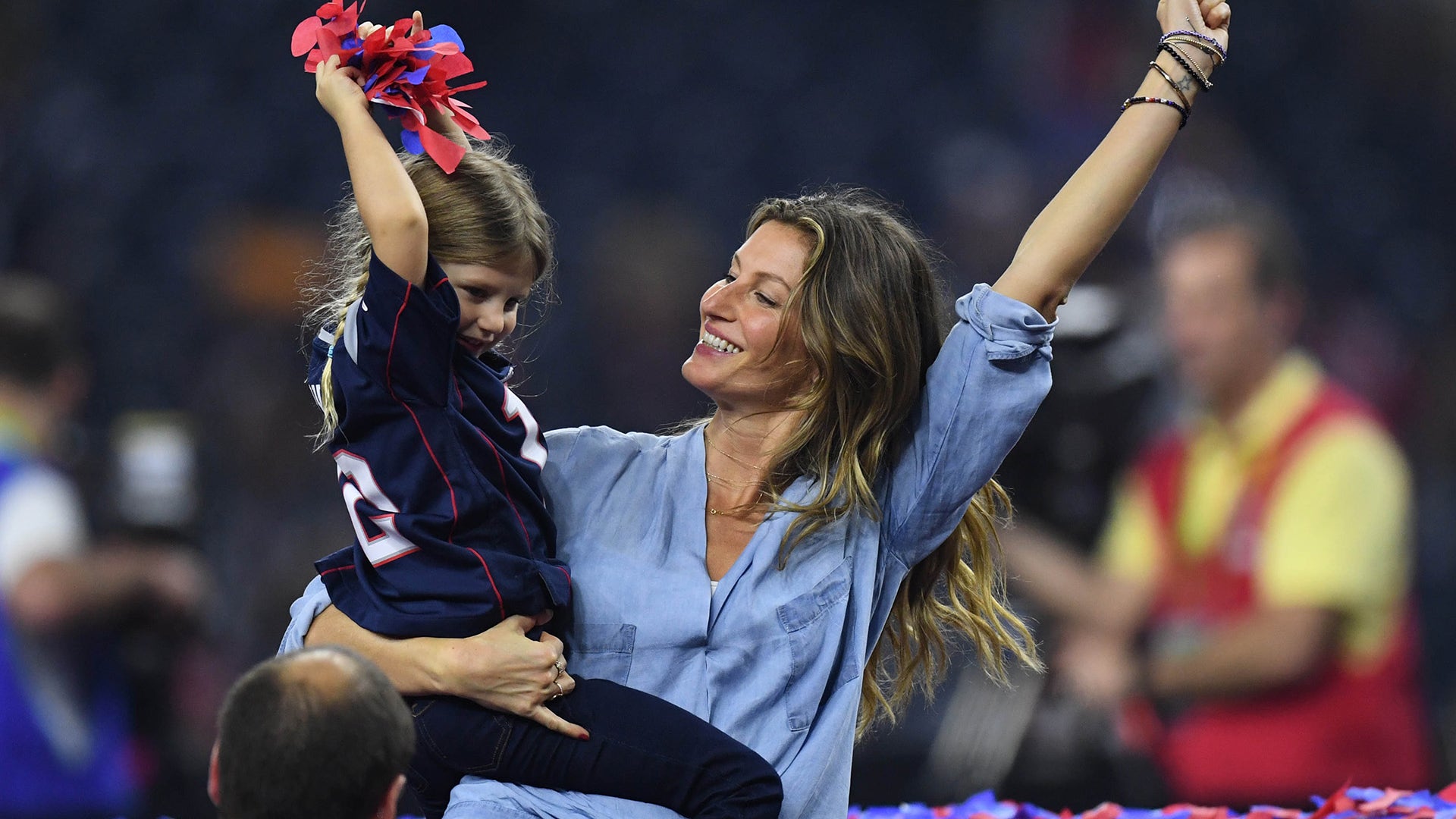 Gisele Bundchen and her daughter Vivian Brady celebrate after the game between the Atlanta Falcons and the New England Patriots during Super Bowl LI at NRG Stadium. 