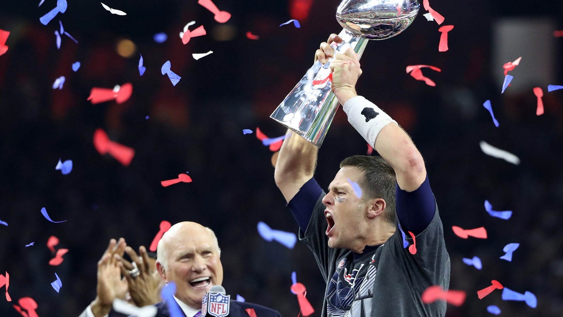 New England Patriots' quarterback Tom Brady holds the  Vince Lombardi trophy after his team defeated the Atlanta Falcons to win Super Bowl LI in Houston, Texas.