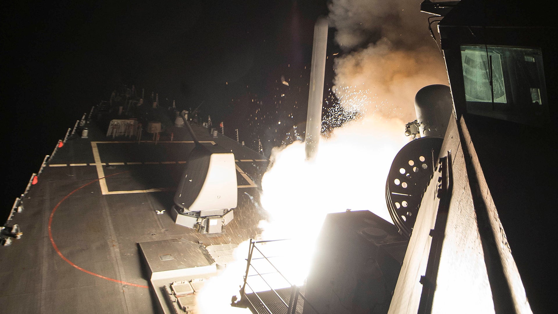 U.S. Navy guided-missile destroyer USS Ross (DDG 71) fires a tomahawk land attack missile in Mediterranean Sea