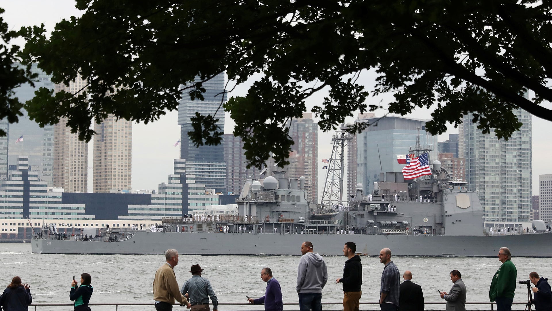 A vessel arrives in New York Harbor to mark the beginning of Fleet Week in New York