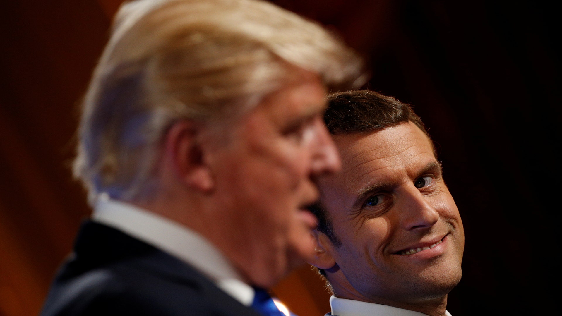 French President Emmanuel Macron and U.S. President Donald Trump at a joint news conference at the Elysee Palace in Paris