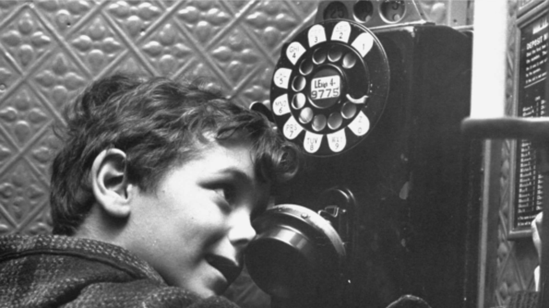 Kids on the phone with Santa, 1947
