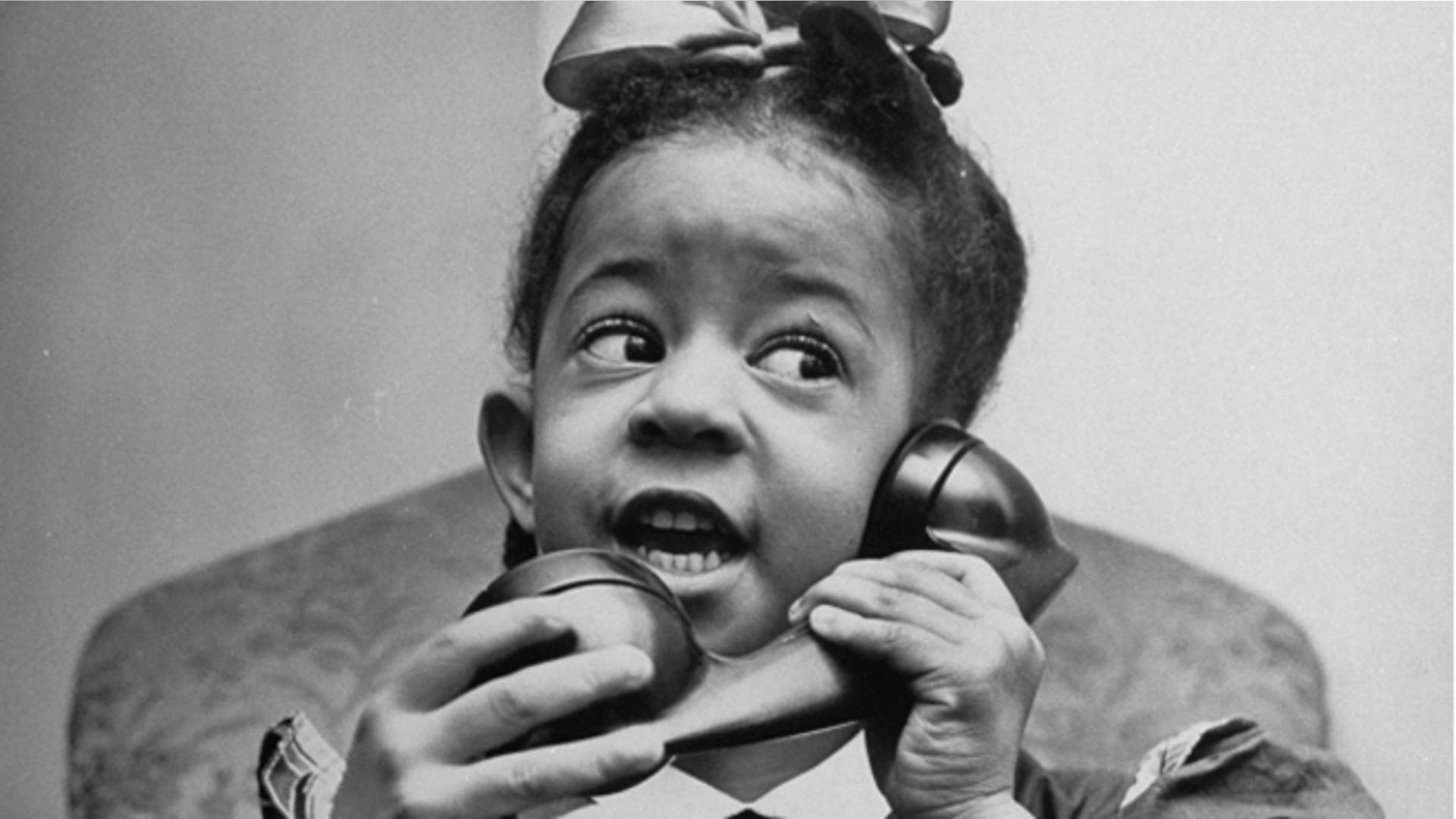 Kids on the phone with Santa, 1947
