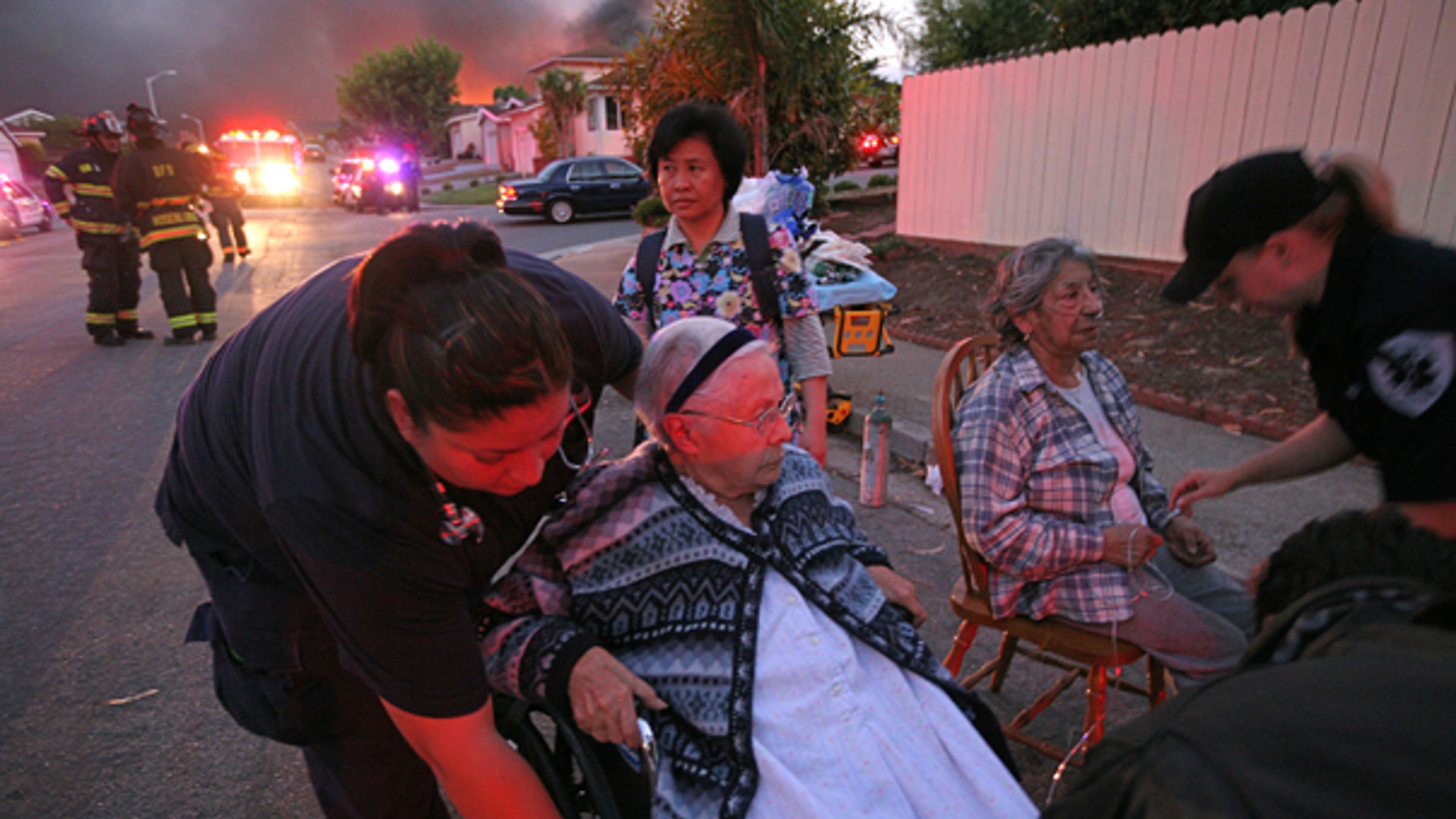 Victims Evacuated from Flames