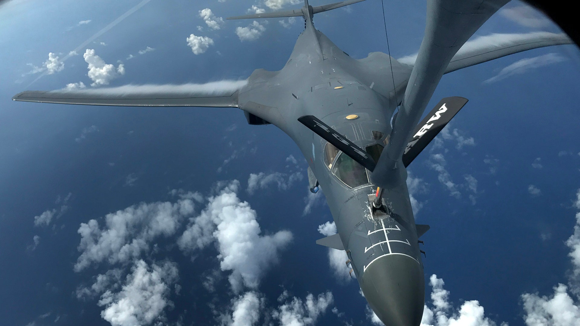 A U.S. Air Force B-1B Lancer assigned to the 37th Expeditionary Bomb Squadron conducts an inflight refueling, Aug. 7, 2017.