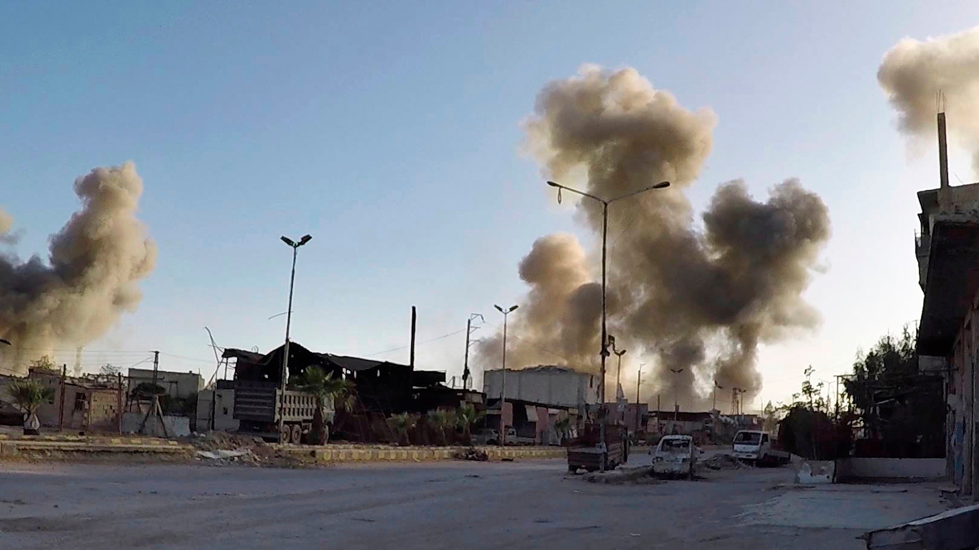 Smoke rising after Syrian government airstrikes hit in the town of Douma, in eastern Ghouta region east of Damascus, Syria, April. 7