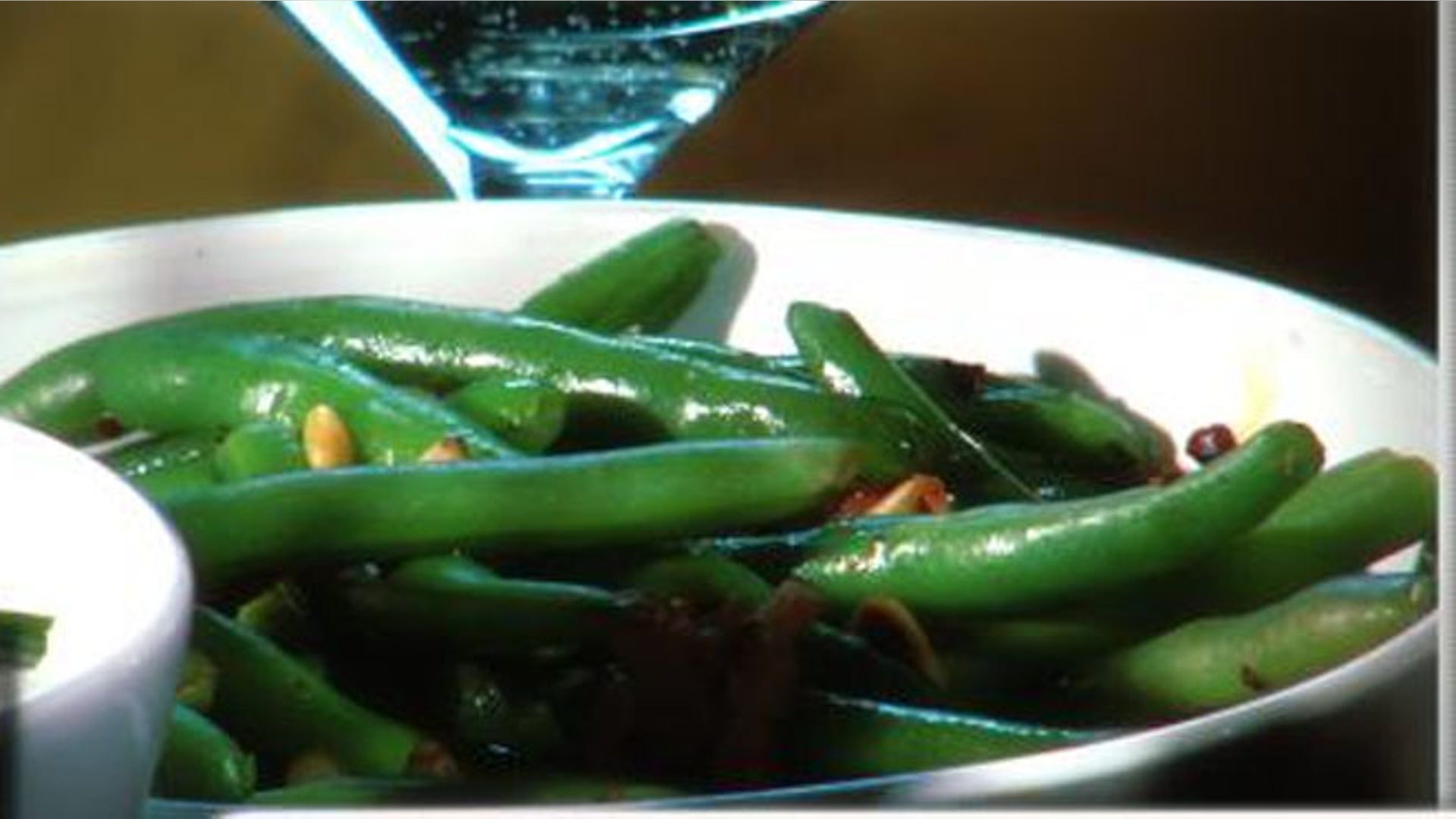 G is for gravy and green beans. The Chardonnay in this Gravy adds a smooth touch of elegance setting it apart from any other gravy out there. Mushy green beans swimming in cream of mushroom soup. I know it's one of the tastiest things on the menu during the holidays. Here's a lighter recipe that doesn't sacrifice flavor.