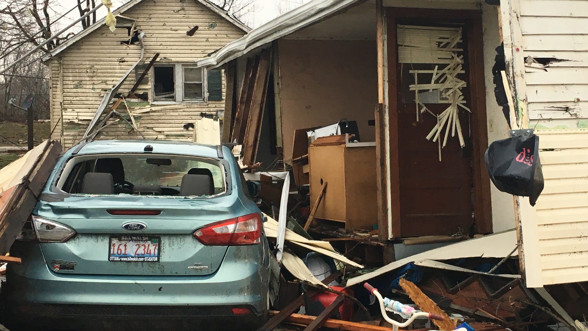 Damaged house after tornado in Naplate, Illinois.