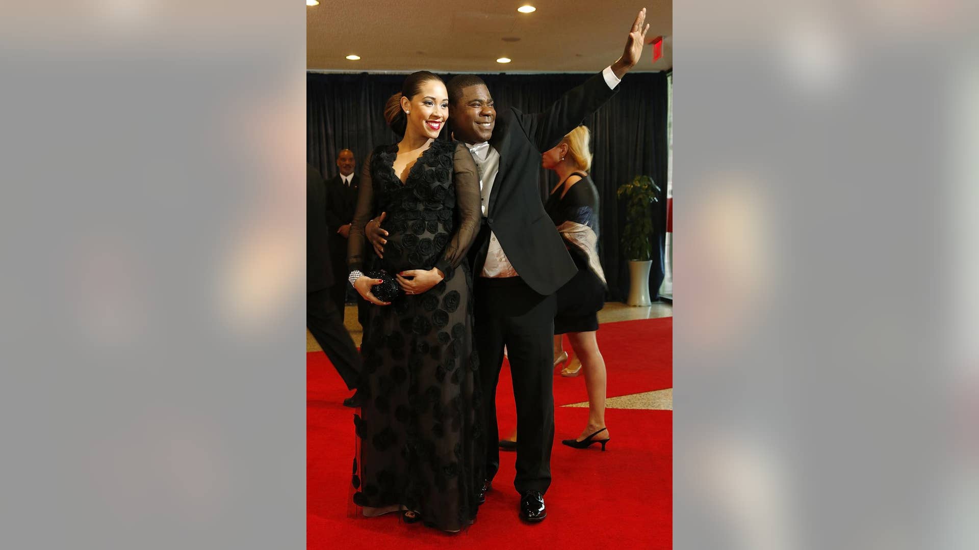 Actor and comedian Tracy Morgan and fiancee Megan Wollover