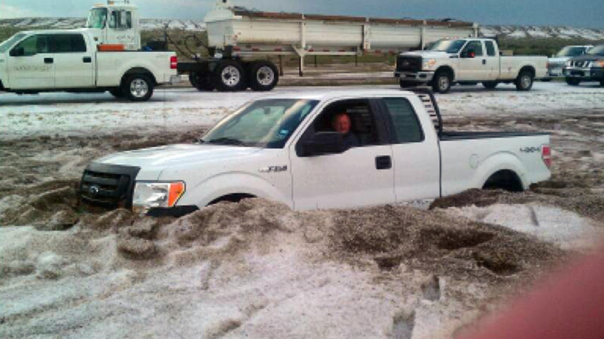 truck_buried_in_hail