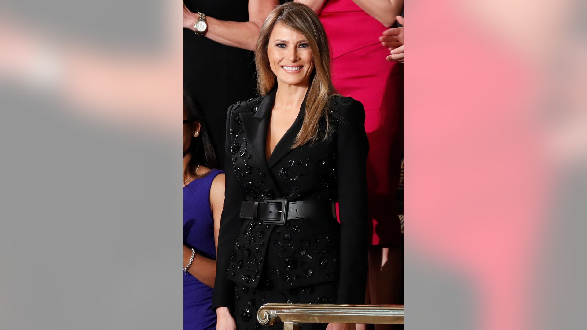 First lady Melania Trump is applauded as she arrives on Capitol Hill in Washington.