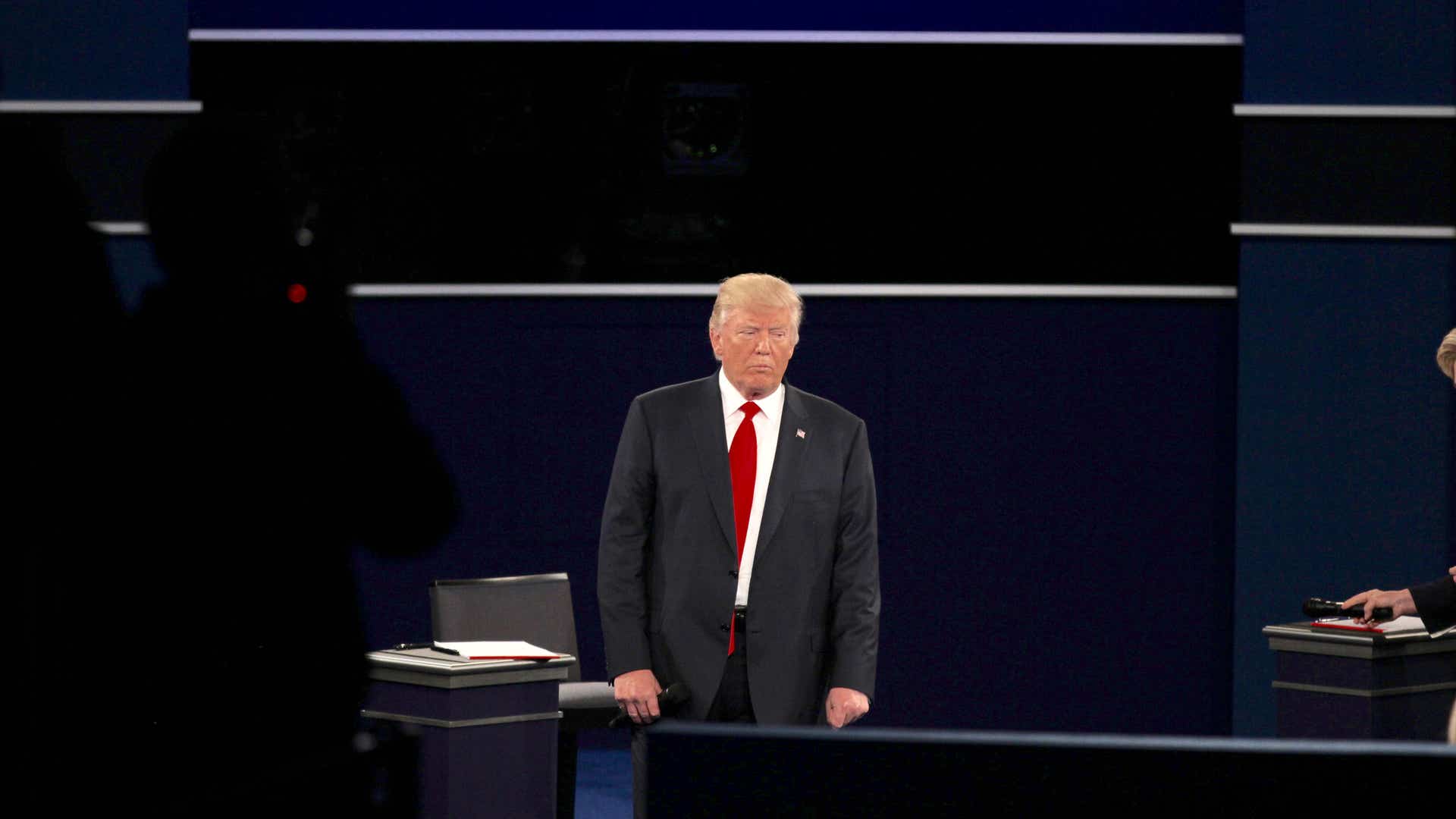 Donald Trump waits to respond.