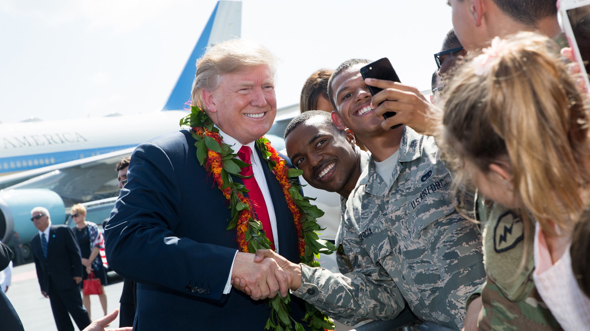 President Trump and first lady Melania Trump visit troops in Hawaii.