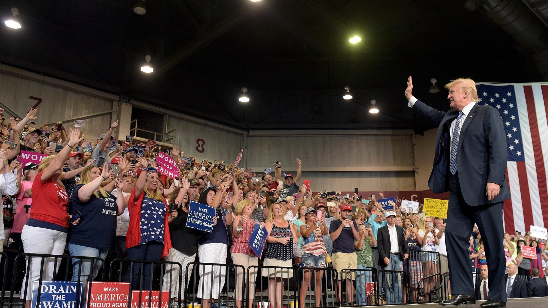 President Donald Trump arrives to speaks at Big Sandy Superstore Arena in Huntington, W.Va., Aug. 3.