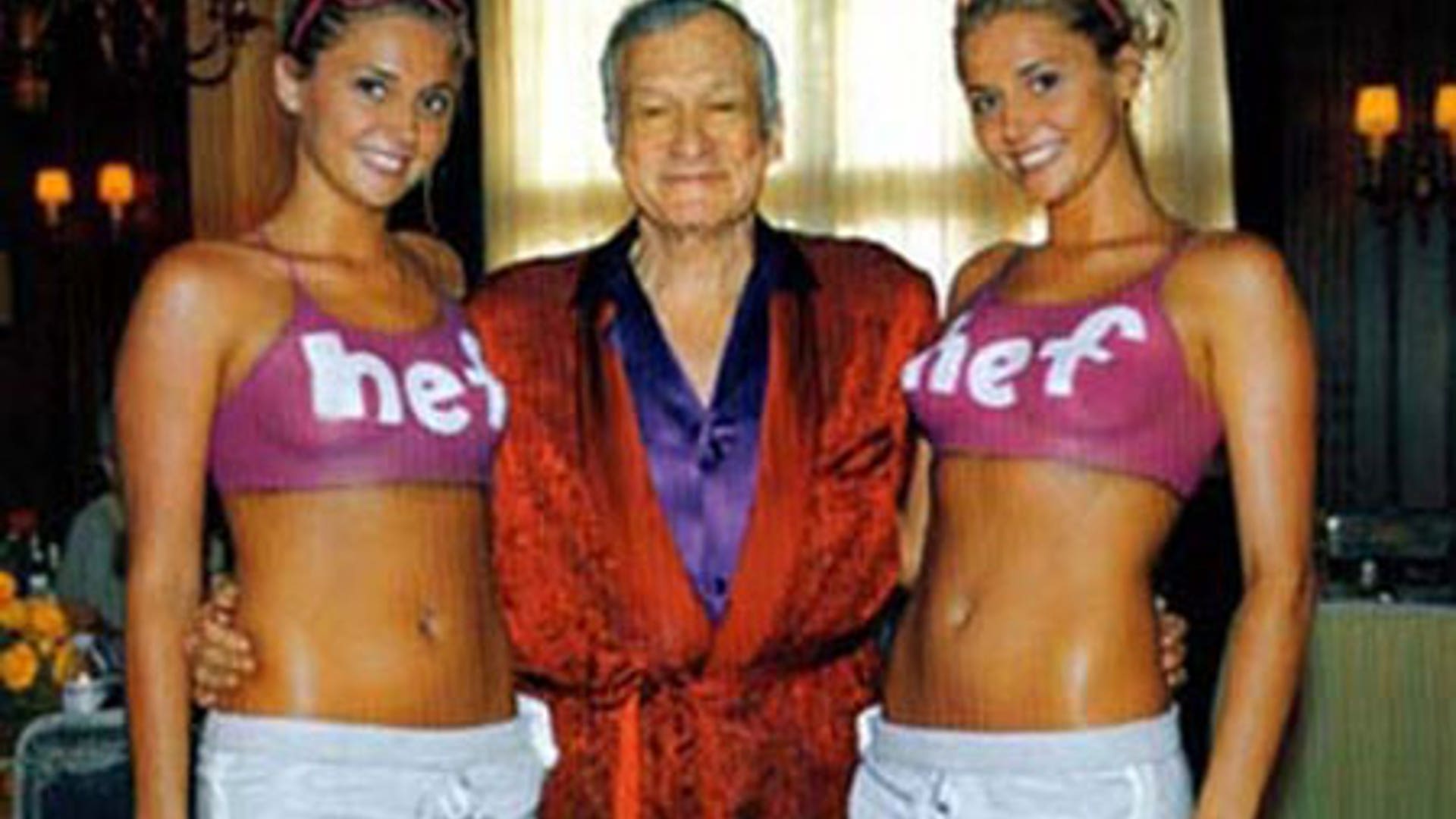 Hugh Hefner and Karissa and Kristina Shannon.