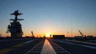 New Navy USS Ford carrier launches armed fighter jets in war drill