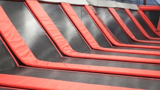 Illinois adult accused of biting security guard at family trampoline center