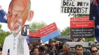 Demonstrators protest Afghan president's Australia visit