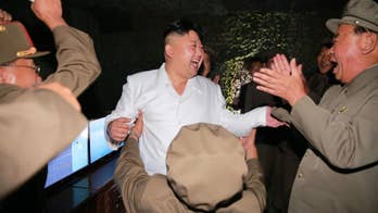 North Korea's Kim praises submarine launch test as a success