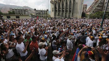The Latest: Venezuelan protesters cross into western Caracas