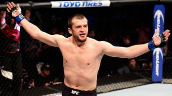 Albert Tumenov ekes out split decision win over Lorenz Larkin